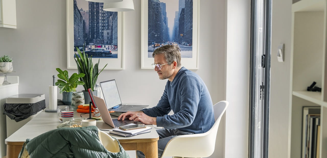 Person organizing digital accounts on a laptop, symbolizing incorporating digital assets into an estate planning strategy.