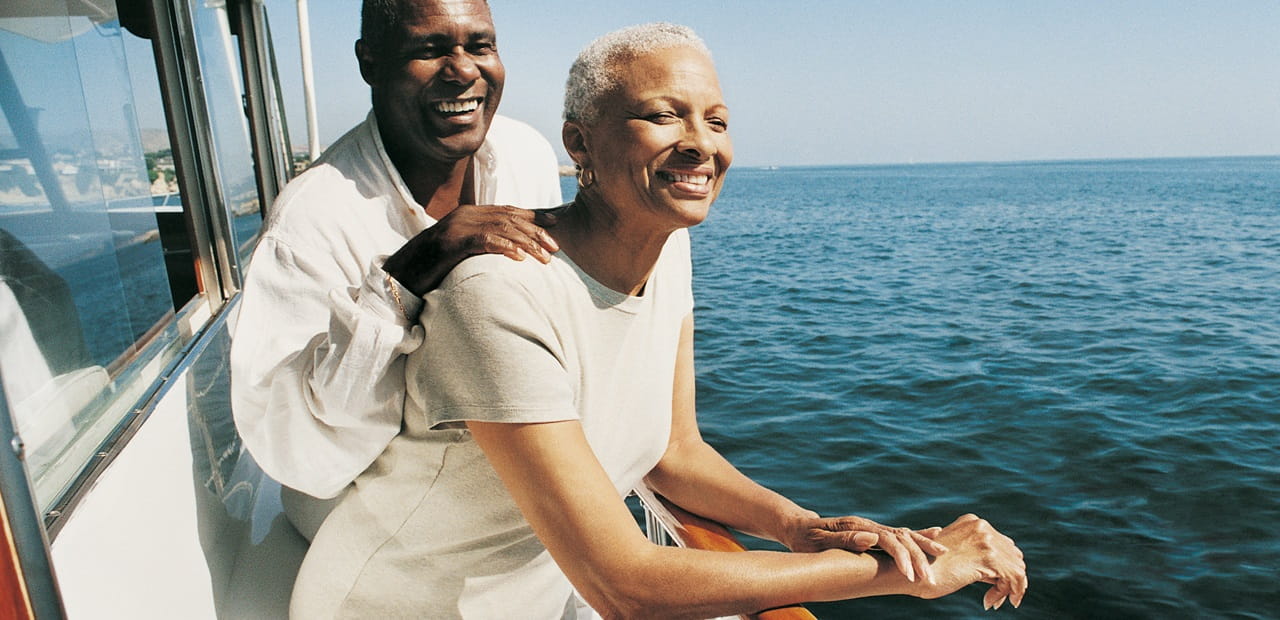 Senior Couple Standing on Deck on a Boat