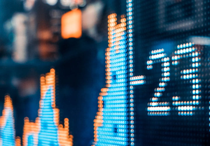 Wall street sidewalk with screen ticker