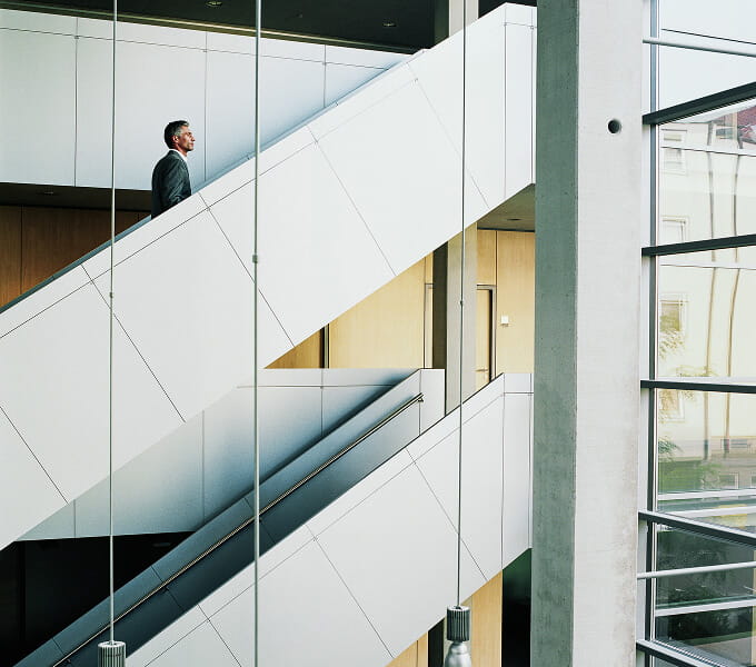 Advisor walking up flights of stairs