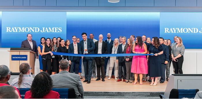 Raymond James Quarterly Update ribbon cutting