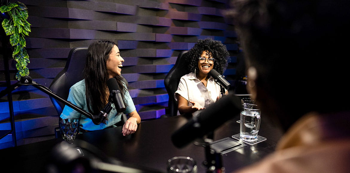 People talking during a podcast at studio